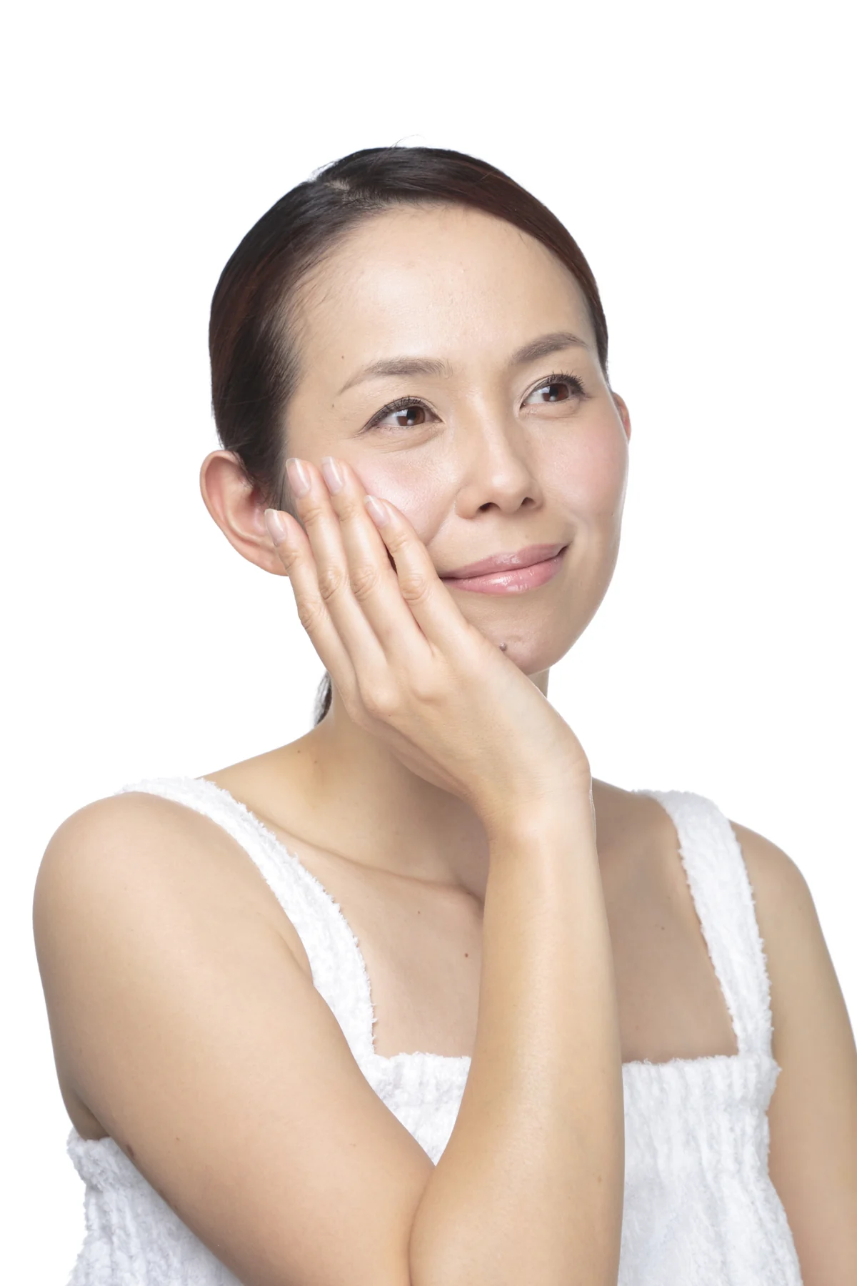 頬にやさしく触れる女性